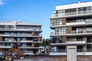 the construction of an premium apartment building, early spring