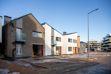 New residential townhouses. Modern apartment buildings. Modern complex of apartment buildings. Concept of real estate development, house for sale and housing market