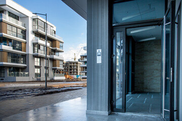 view from the entrance to a new residential complex with apartments in an elite area