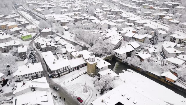 Aerial view of Tryavna buildings covered in snow, Bulgaria