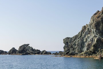 Aerial view of sea with rocky beach