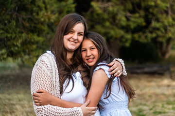 Fototapeta premium Sisters embracing 