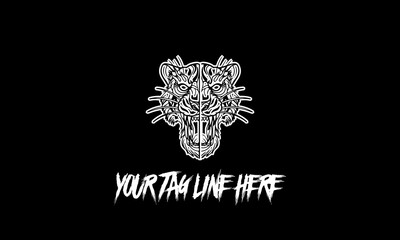 Company or brand logo of a tiger isolated on a dark gray background with copy space