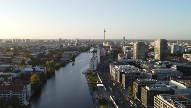 Drone view of the Spree River surrounded by buildings in Berlin, Germany