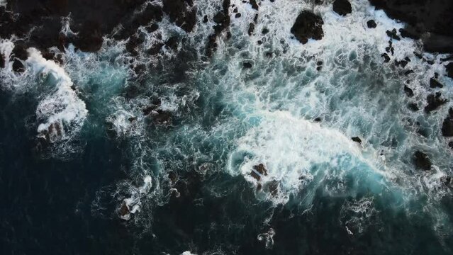 Waves hitting on the rocks in the Atlantic ocean