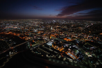 Night aerial view towards urban downtown Los Angeles in Southern California.