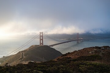 Landscape of the Golden Gate bridge under a cloudy sky in San Francisco, California