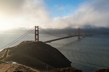 Landscape of the Golden Gate bridge under a cloudy sky in San Francisco, California