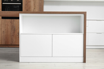 White counter with drawers in light kitchen