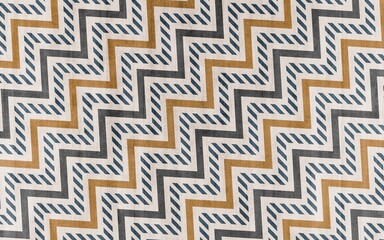 Illustration of colorful geometric shapes isolated on a carpet-textured background