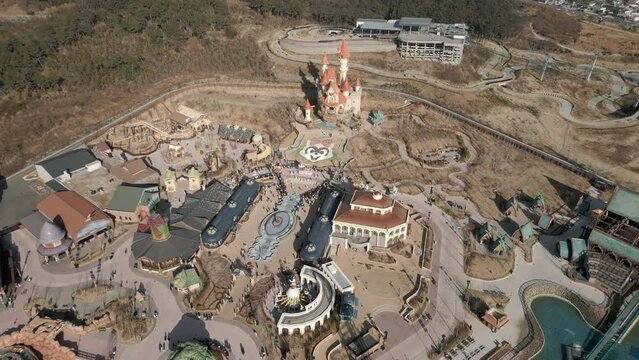 Drone footage over Roller Coaster at Lotte World Amusement Park at Osiria Busan, South Korea
