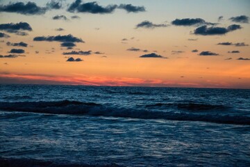 Sunset over beach in Zeeland