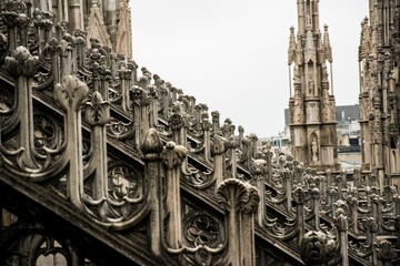 Close-up shot of architectural sculpture details of Duomo di Milano