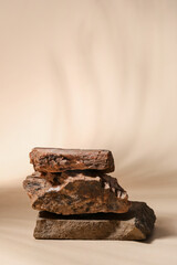 Decorative stone podiums on beige background