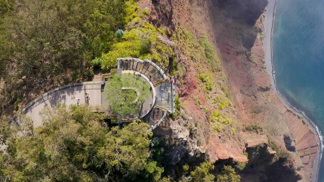 Beautiful landscape of a cliff facing teh sea in the Madeira Island