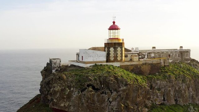 Drone shot of Ponta de Sao Lourenco lighthouse with a seascape view on a sunny day