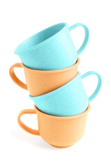 Colorful cups isolated on white background. Children's Day celebration