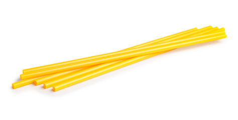 Yellow plastic straws on white background