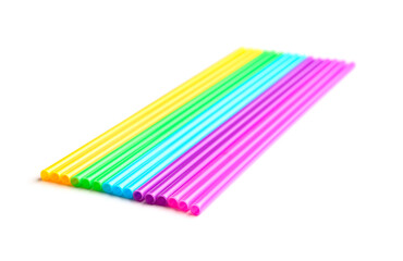 Different plastic straws on white background