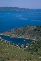 Fototapeta premium Top view of a small beach in Hydra a Greek island 
