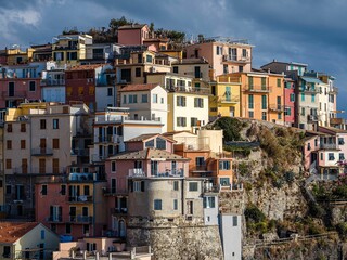 Fototapeta na wymiar Low-angle view of modern buildings in Cinque Terre, Italy
