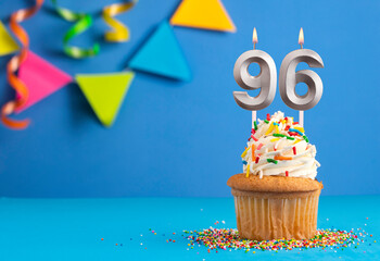 Birthday cake with candle number 96 - Blue background