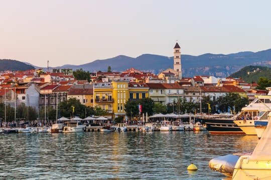 Scenic view of a Crikvenica harbor with buildings located on the shore