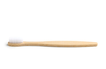 Bamboo toothbrush on white background
