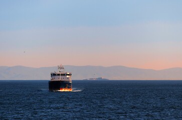 Beautiful scenery of an industrial ship in the blue sea
