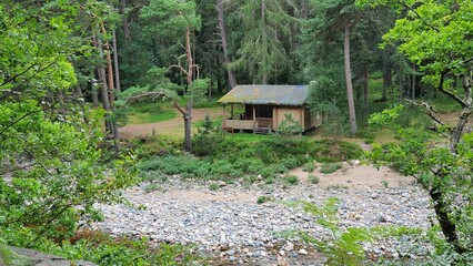 Wooden cabin in a forest in Braemar, Scotland