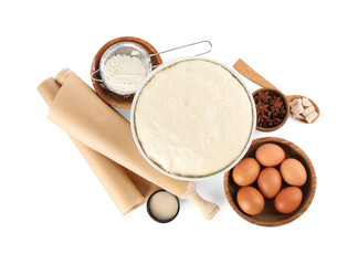 Composition with fresh yeast dough, parchment paper and ingredients on white background, top view. Making cake