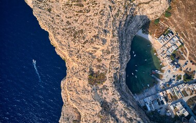 Aerial shot of the inland sea Gozo at Dwejra bay in Malta