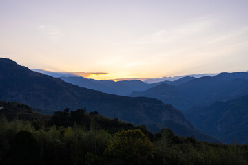 Fototapeta na wymiar Sunset sunlight flare over the mountain