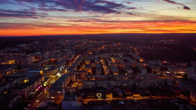 Aerial hyperlapse of the city of Pitesti in Romania under the sunset