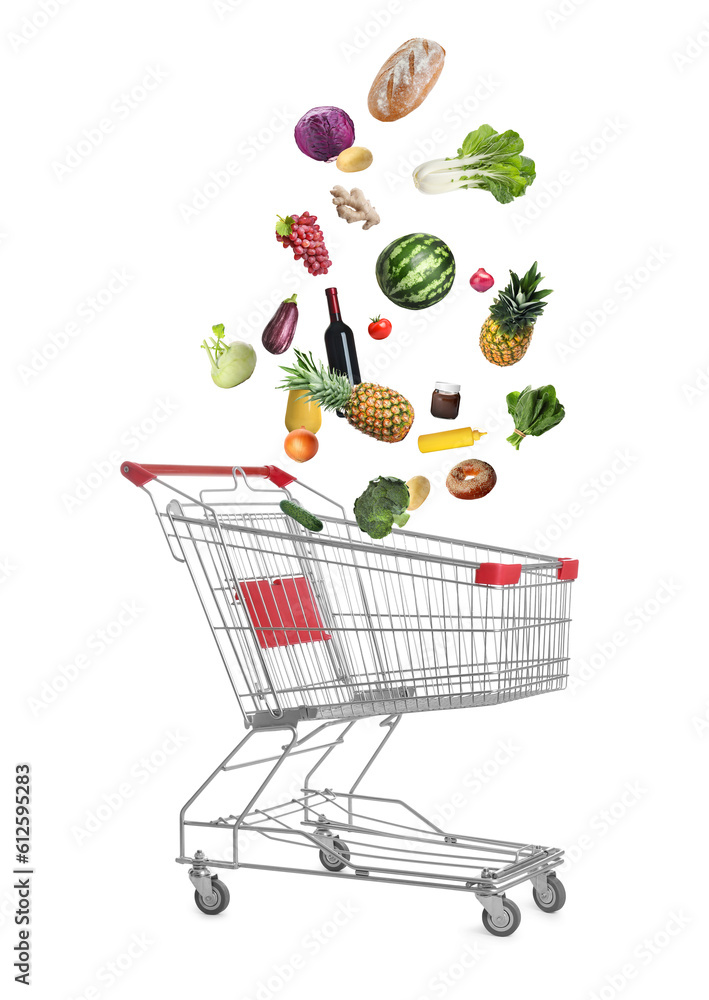 Poster Market assortment. Different products falling into shopping cart on white background