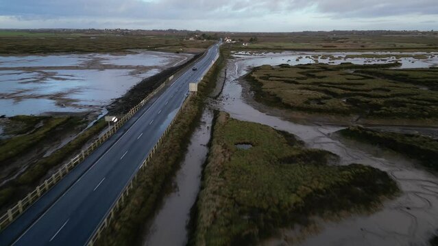 Drone footage of The Stroud causeway to Mersea Island at low tide.