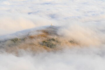 Aerial view of the mountains in the fog