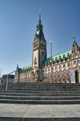 Fototapeta na wymiar Vertical shot of the Hamburg city hall in Germany.