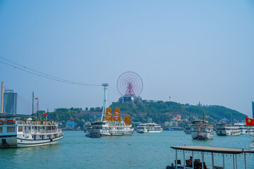 Bai Chay bridge and Sunwheel in the early morning with beautiful clouds in Ha Long, Vietnam....