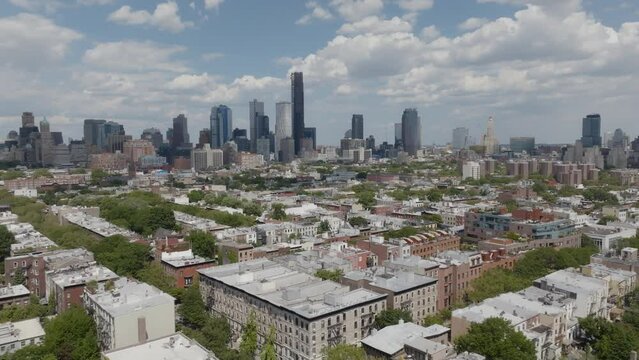 Pulling away from the high rises of Brooklyn and over the rooftops of Cobble Hill