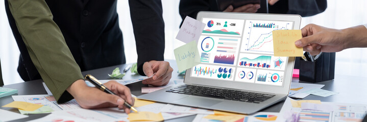 Analyst team use sticky note for creative and analytic brainstorm for business idea with BI data...