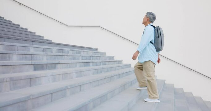 asian elderly walking stairs well