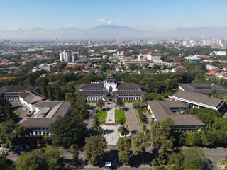 Fototapeta na wymiar Aerial View of Gedung Sate, an Old Historical building with art deco style. Nowadays it is become a Governor Office, icon and landmark of Bandung, Indonesia