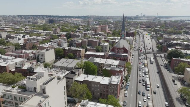 Traffic moves along the highway in Brooklyn near Cobble Hill