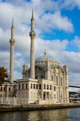 Fototapeta na wymiar Vertical shot of the Grand Mecidiye Mosque under the clouds in Istanbul, Turkey