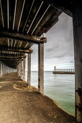 Under interior of a wooden boardwalk bridge
