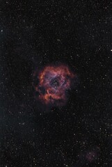 the cat's eye nebula with a dark background and bright stars © Leonardo Nappi/Wirestock Creators