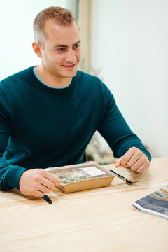 man ready to enjoy take out food
