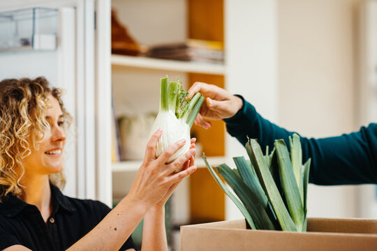 Young Couple Unpacking Food