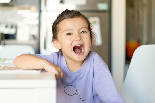 girl grimacing at the camera